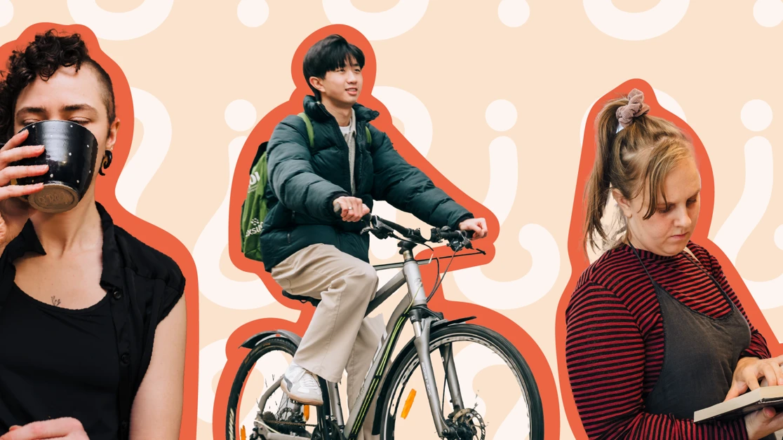 En kvinna skriver på lappar på väggen