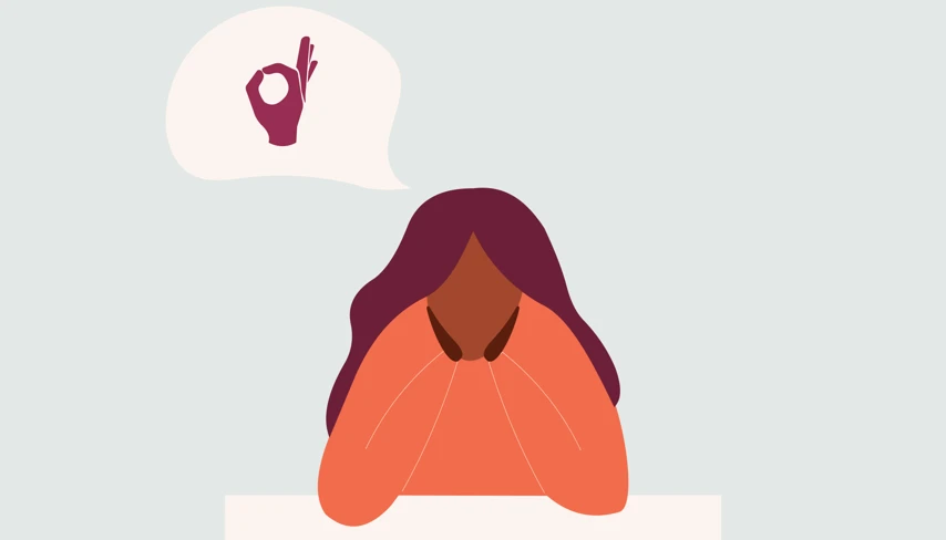En kvinna med huvudet i händerna och en tankebubbla ovanför sig.